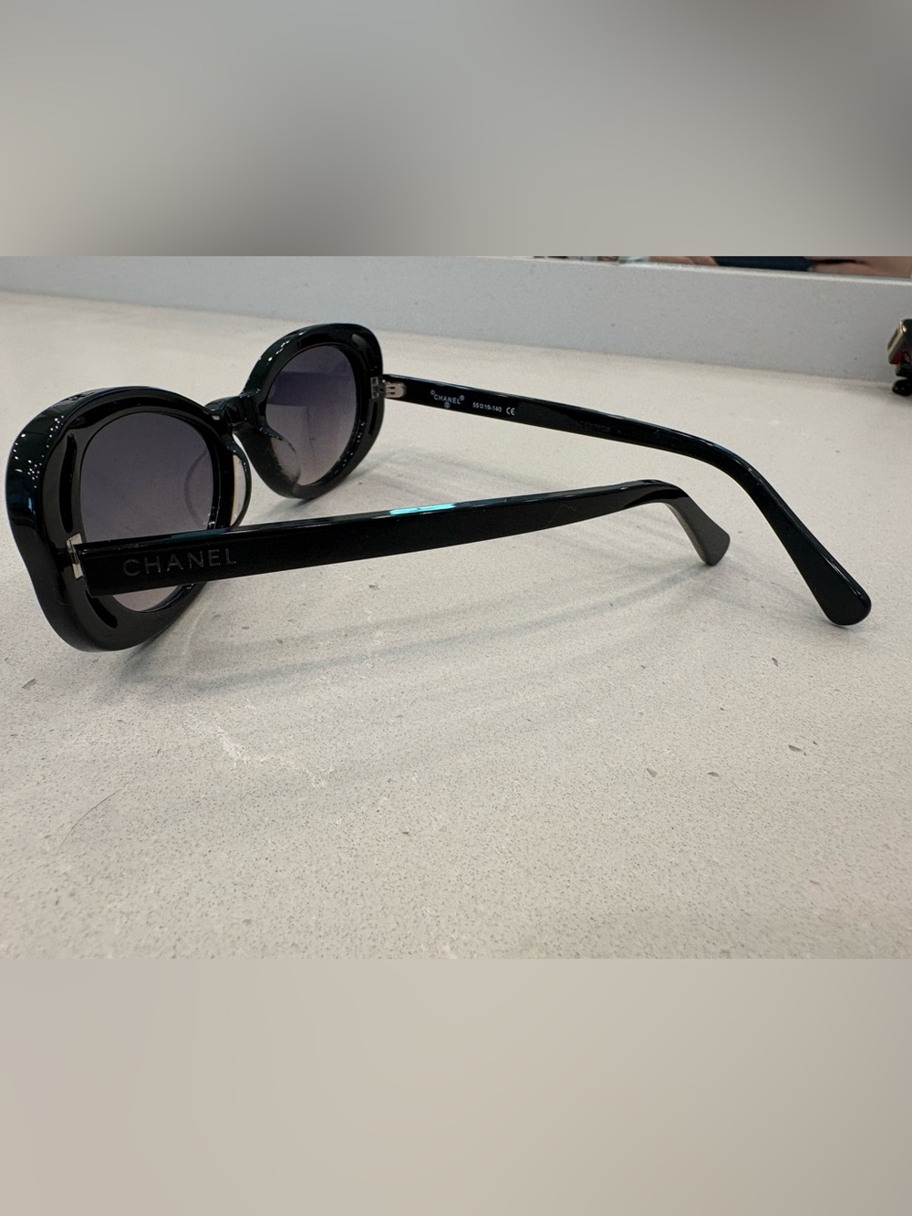 CHANEL Black Oval Logo-Accent Sunglasses - Picture 2 of 3